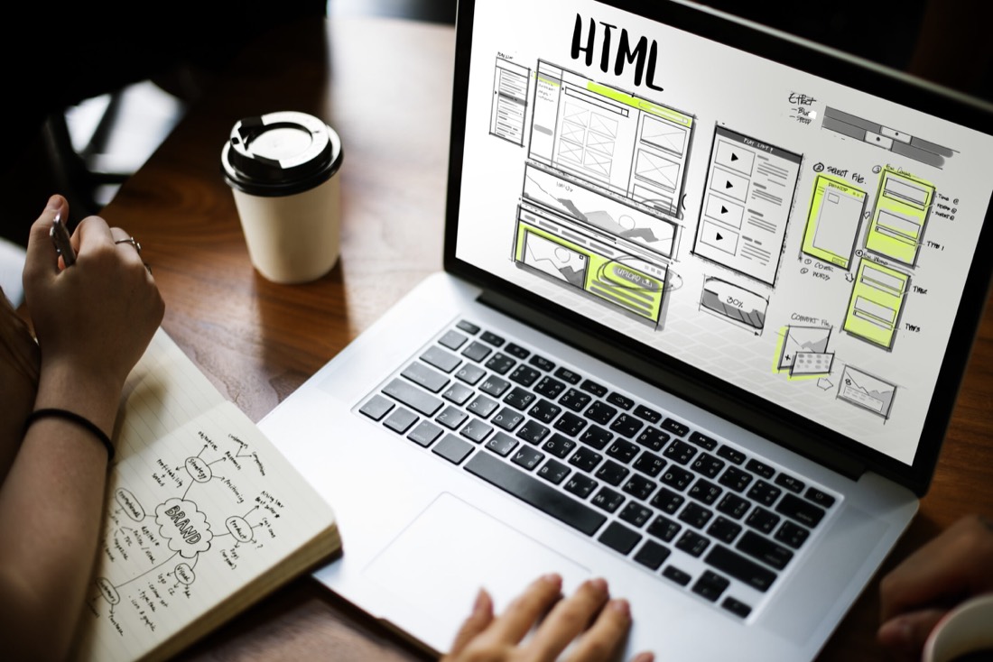 A website design shown on a laptop, tablet and phone